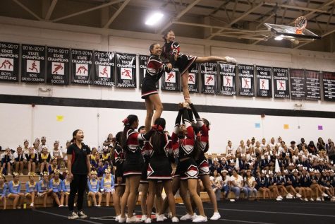 The Iolani Intermediate Cheer team executes a stunning performance at the ILH competition.