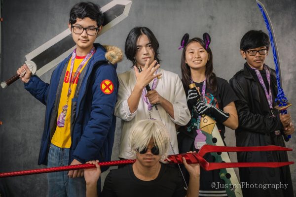 (From left to right) Cosplay Club members Deejay P. 26, Cole M. 24, Cate 26, Landon D. 26 and Alex A. 26 pose for a group photo taken at Kawaii Kon.  // Photo courtesy of @JustonPhotography.