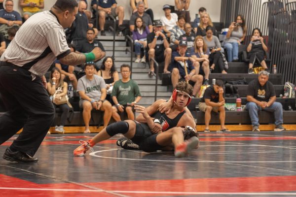 Malu Peloso ’28 pins his opponent, a wrestler from Damien, winning his match on February 8th. He would go on to finish sixth in his weight class for ILH Champs.