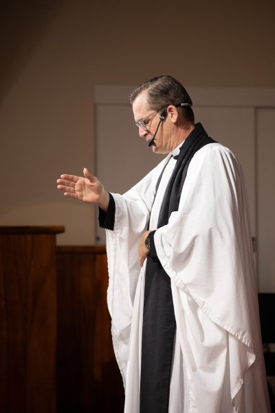 Chaplain Morehouse, a staple figure in ‘Iolani’s spiritual life, is pictured giving his final remarks of the day to the juniors and seniors during their weekly chapel service. At the end of every service, Chaplain Morehouse intones the Trinitarian formula, saying, “In the name of the Father, Son, and the Holy Spirit, amen.”