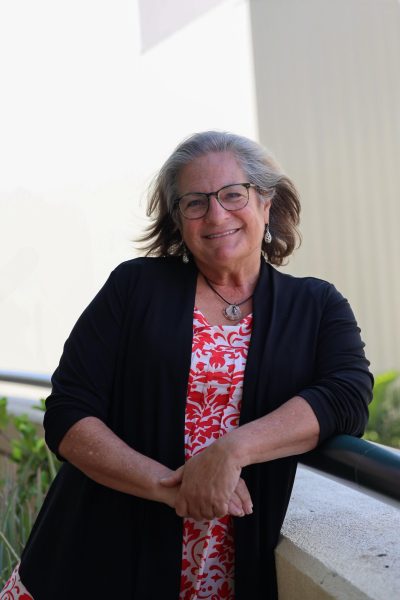 Ms. Cate Waidyatilleka, an English teacher at ‘Iolani for 37 years, is pictured on the balcony of her classroom.