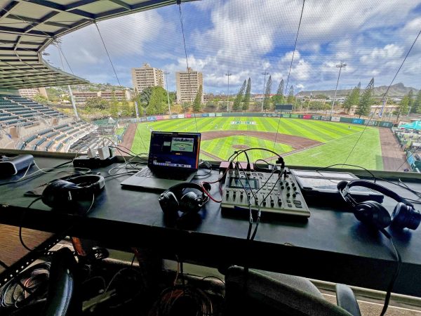 The setup of the broadcast at an away game for the Boys Baseball team at Les Murakami Stadium. 
